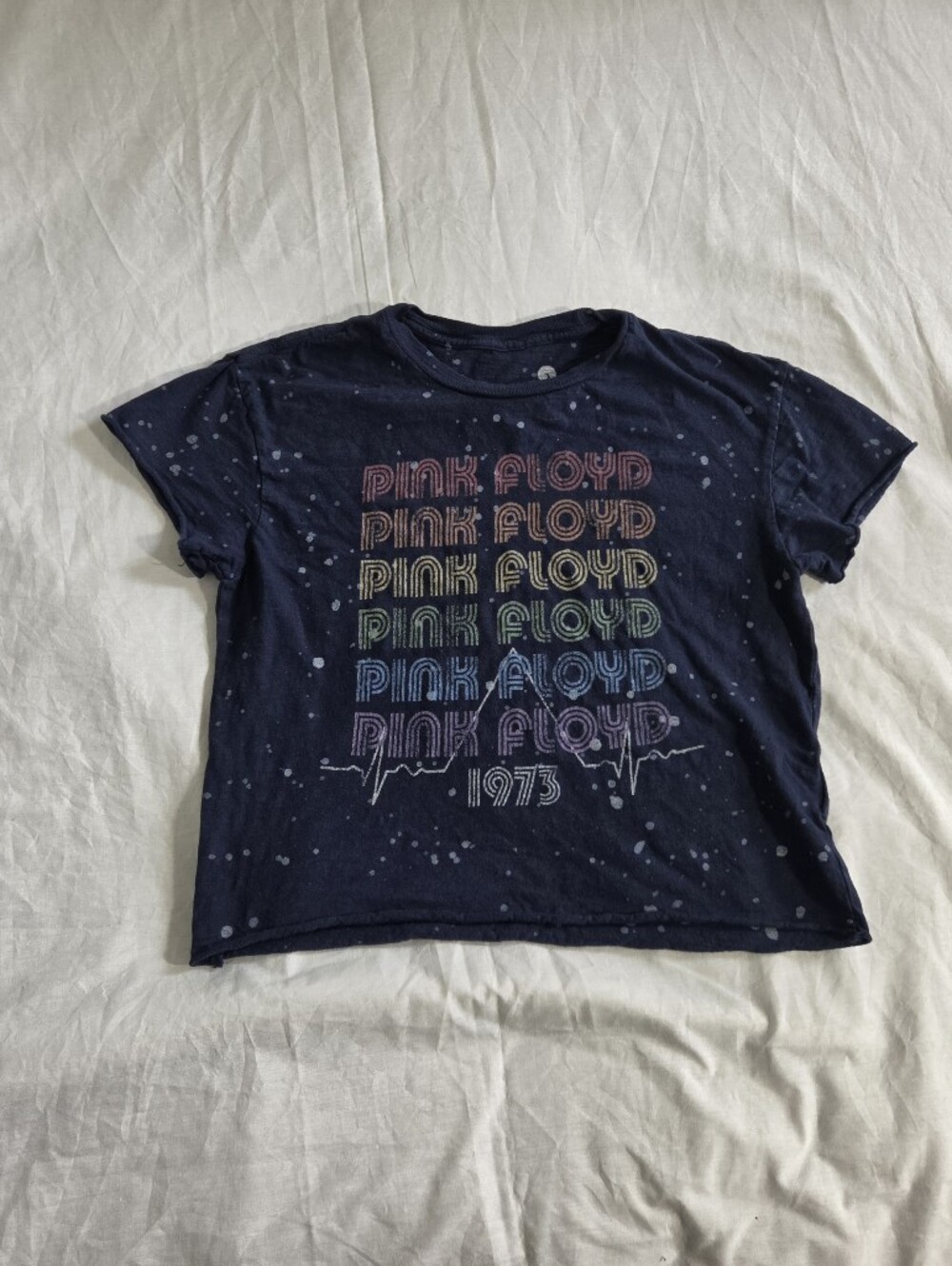 Pink Floyd band tee with 'PINK FLOYD' repeated in rainbow gradient with '1973'